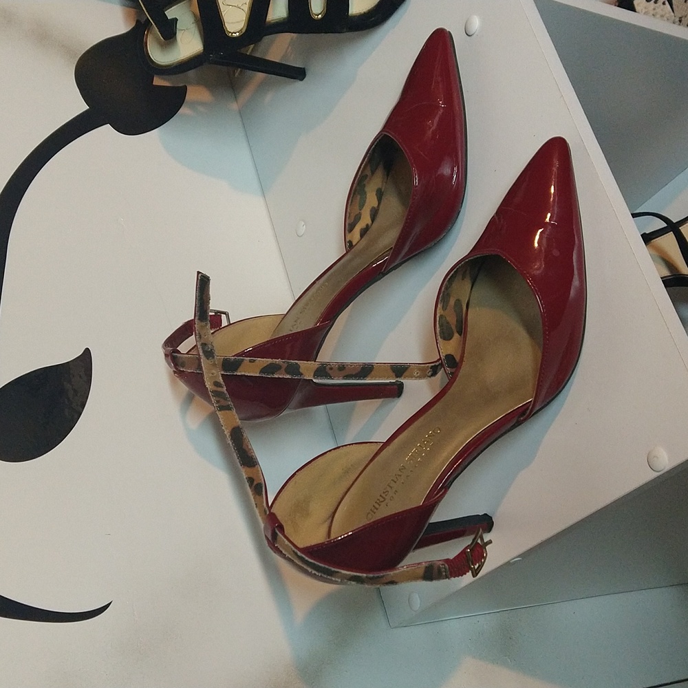 Red patent leather pumps